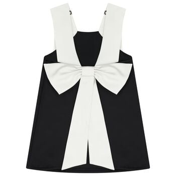 فستان بنات باللون أسود وأبيض مزين بفيونكة