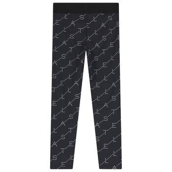 بنطلون ضيق باللون الأسود بشعار للبنات