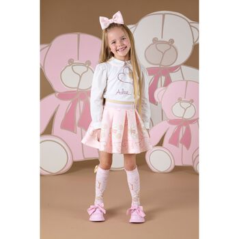 حذاء رياضي بفيونكة باللون الوردي 