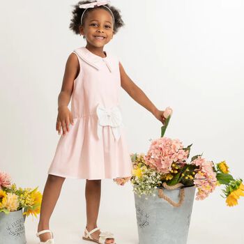 طقم فستان بفيونة و ربطة راس بنات باللون الوردي