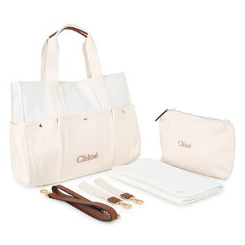 حقيبه تغيير حفاضات بالشعار باللون العاجى 